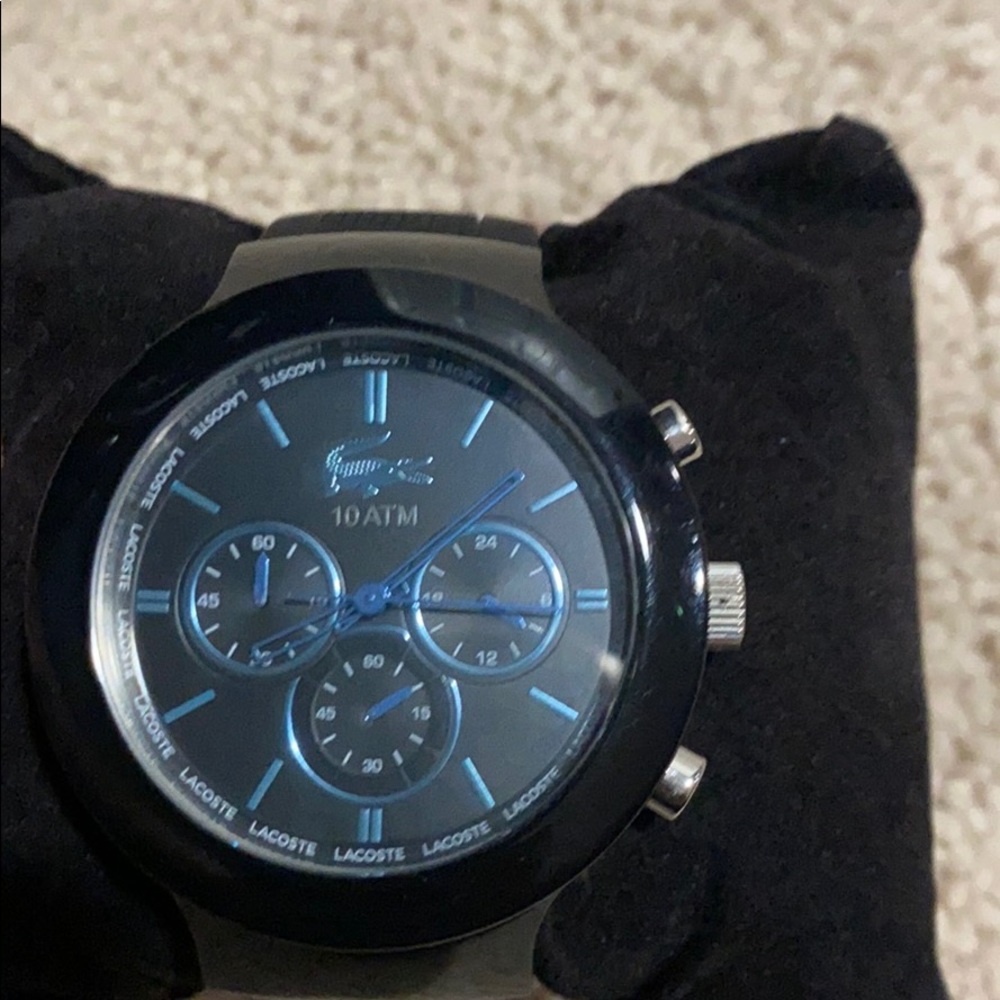 Lacoste watch two tone black and baby blue.